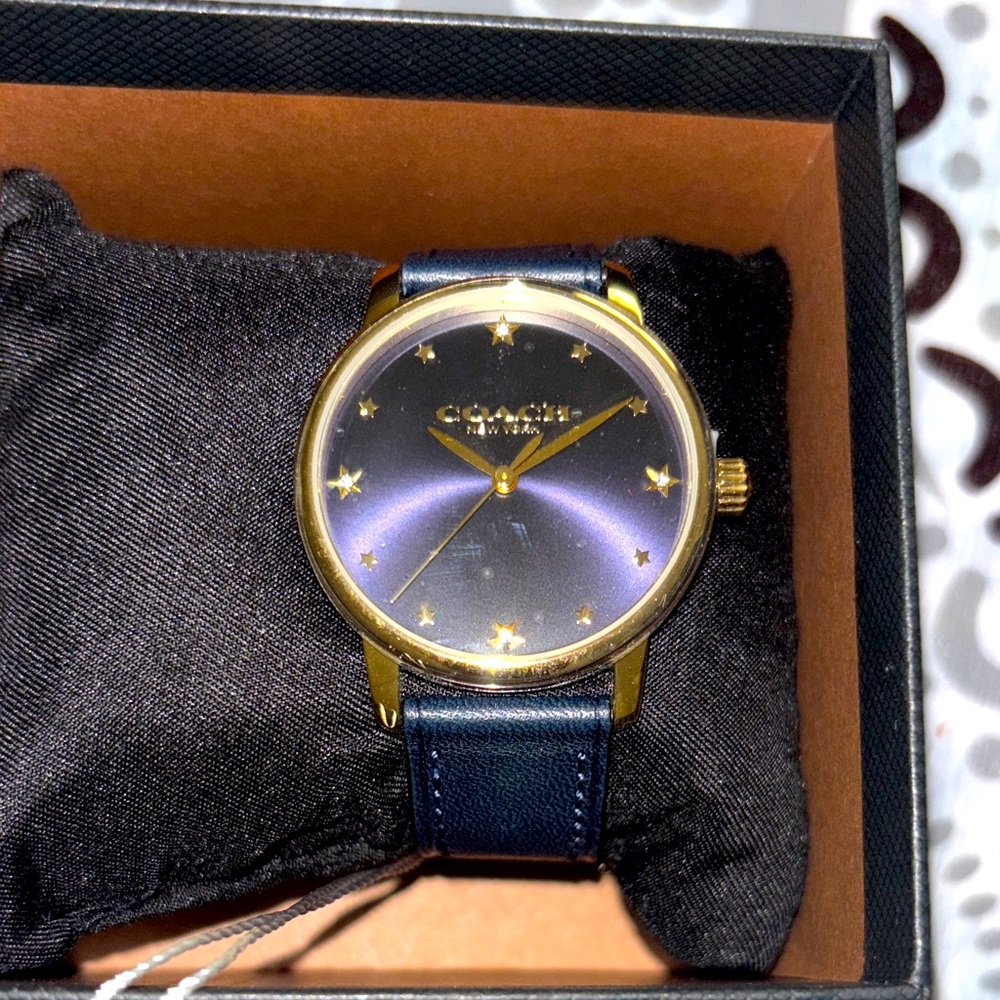 Coach Gold and Navy Woman’s Watch